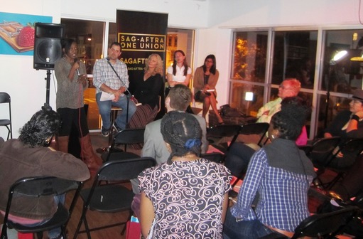 Lois Seffu of SAG-AFTRA speaks to the group as Dave Mallen of Metro Music Source, and SAG-AFTRA staff members Sara Bennett, Anee Raulerson, and Purvi Patel look on.