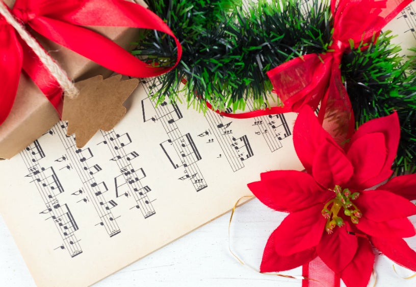 Sheet music and poinsettas.