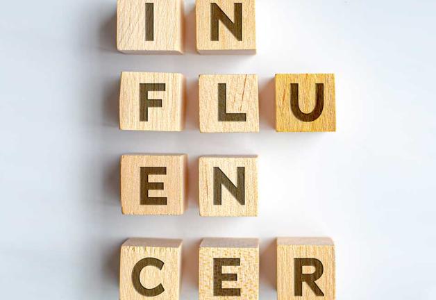 Influencers in block letters