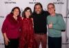 Members smile for a photo in front of a SAG-AFTRA backdrop.